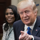 President Donald Trump holds an African American History Month listening session attended Omarosa Manigault (L) and other officials in the Roosevelt Room of the White House on February 1, 2017 in Washington, DC.